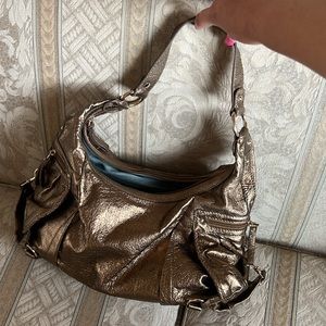 The Sak bronze metallic bag